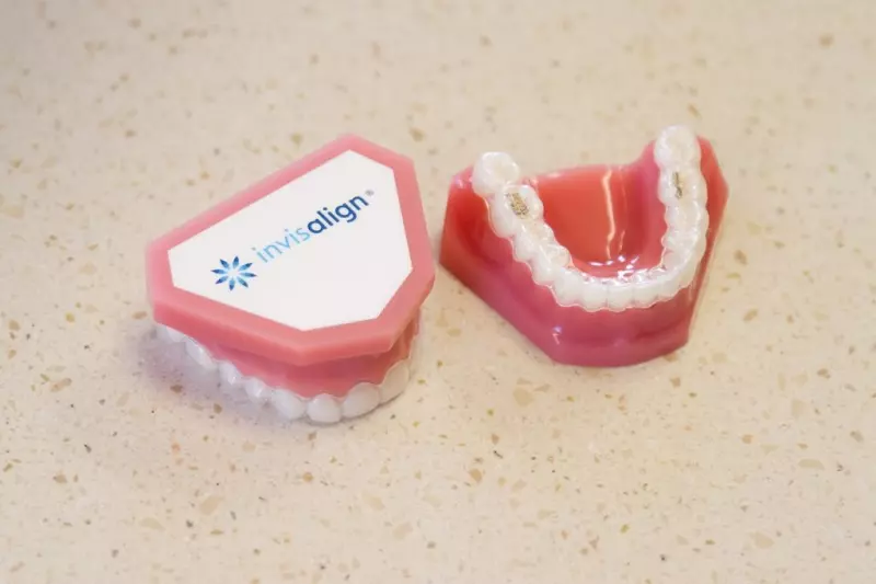 A pair of fake teeth sitting on top of a counter.